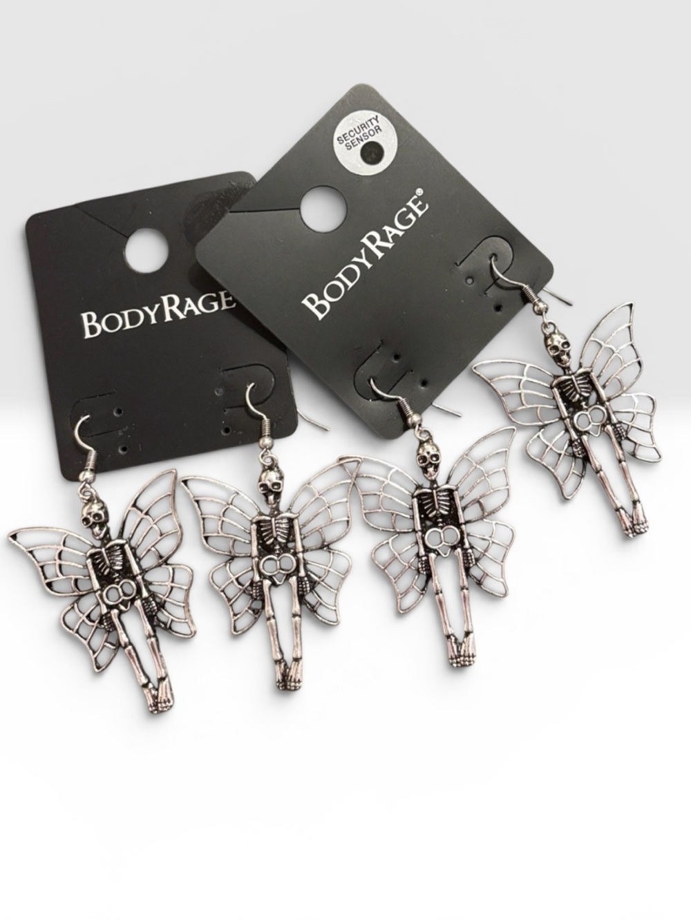 NWT 2 Pairs Body Rage Spencer Winged Skeleton Earrings Goth Alternative
